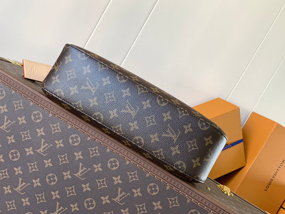 Chic Louis Vuitton Monogram Hobo Bag With Stylish Curved Shape And Top Handle