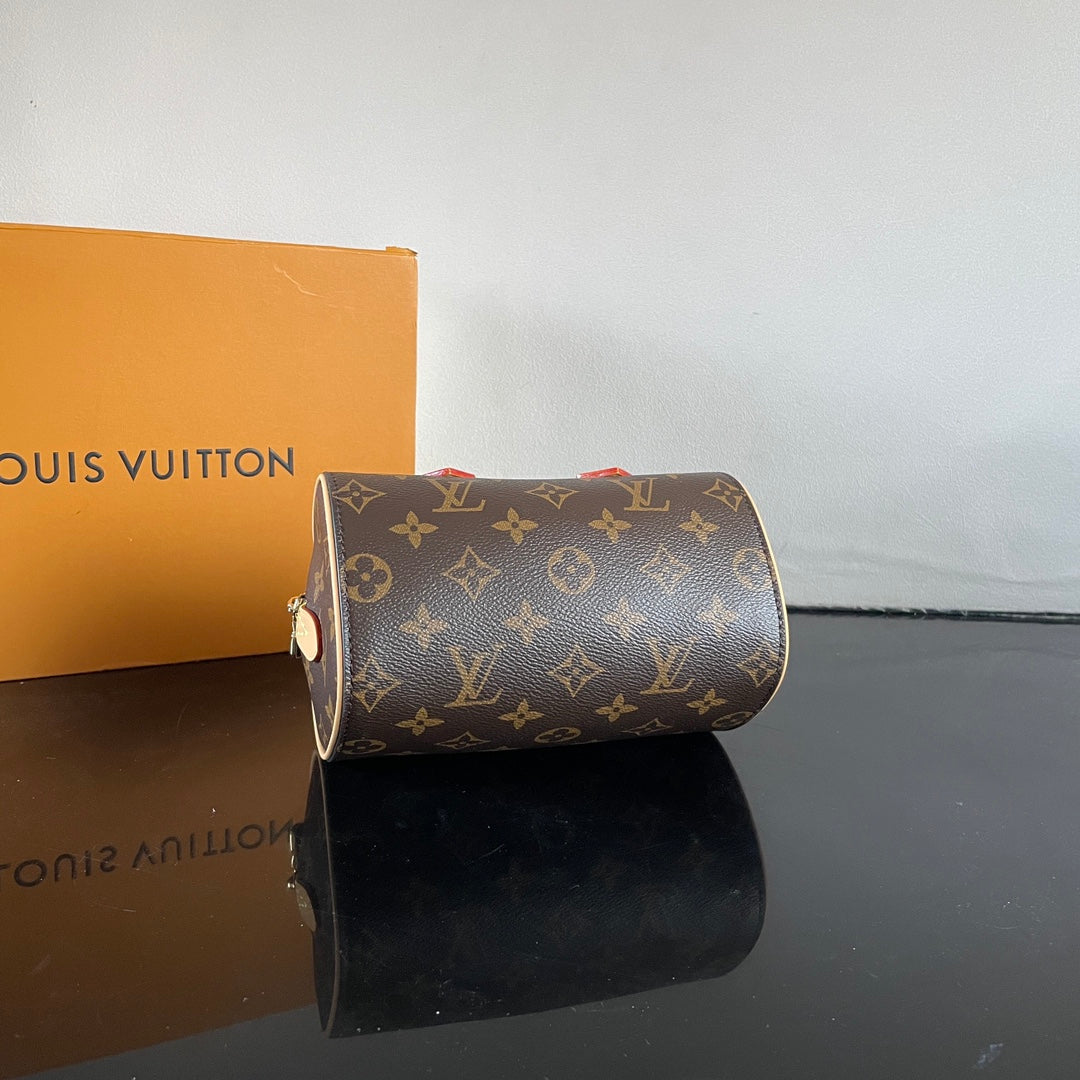 Stylish Louis Vuitton Nano Speedy Bag with Iconic Monogram and Luxe Leather Details