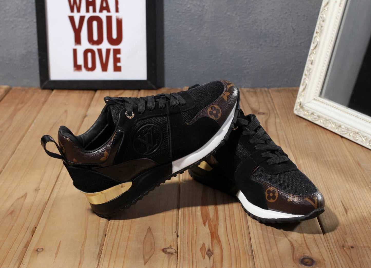 Louis Vuitton Women's Fashion Sneakers With Gold Accents And Signature Patterns