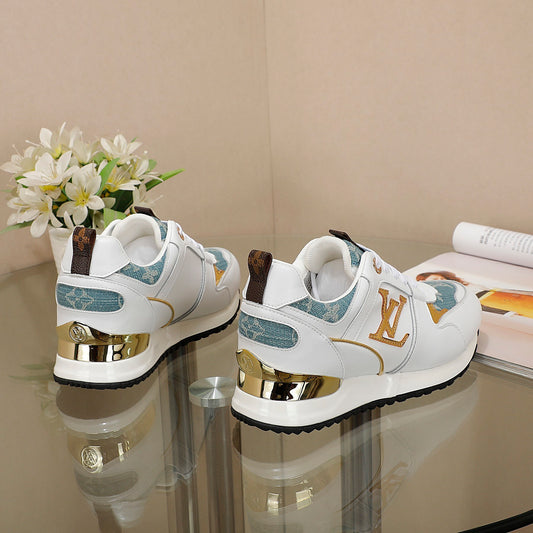 Louis Vuitton Women's White Sneakers With Blue Patterns And Gold Accents