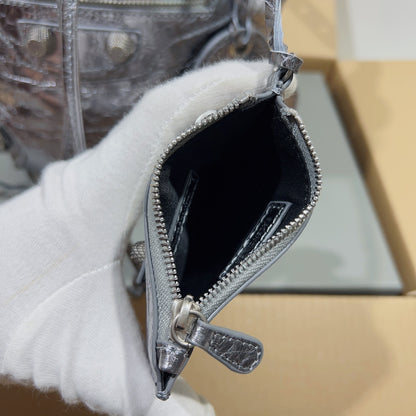 Metallic Balenciaga Bucket Bag with Studs and Adjustable Straps for Edgy Fashion Style No.3033