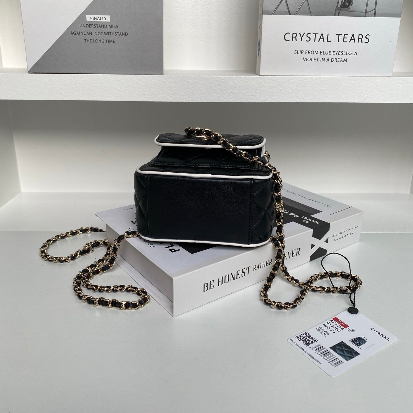Chanel Quilted Black Leather Mini Backpack with White Trim and Gold - Tone Chain Straps AP4514