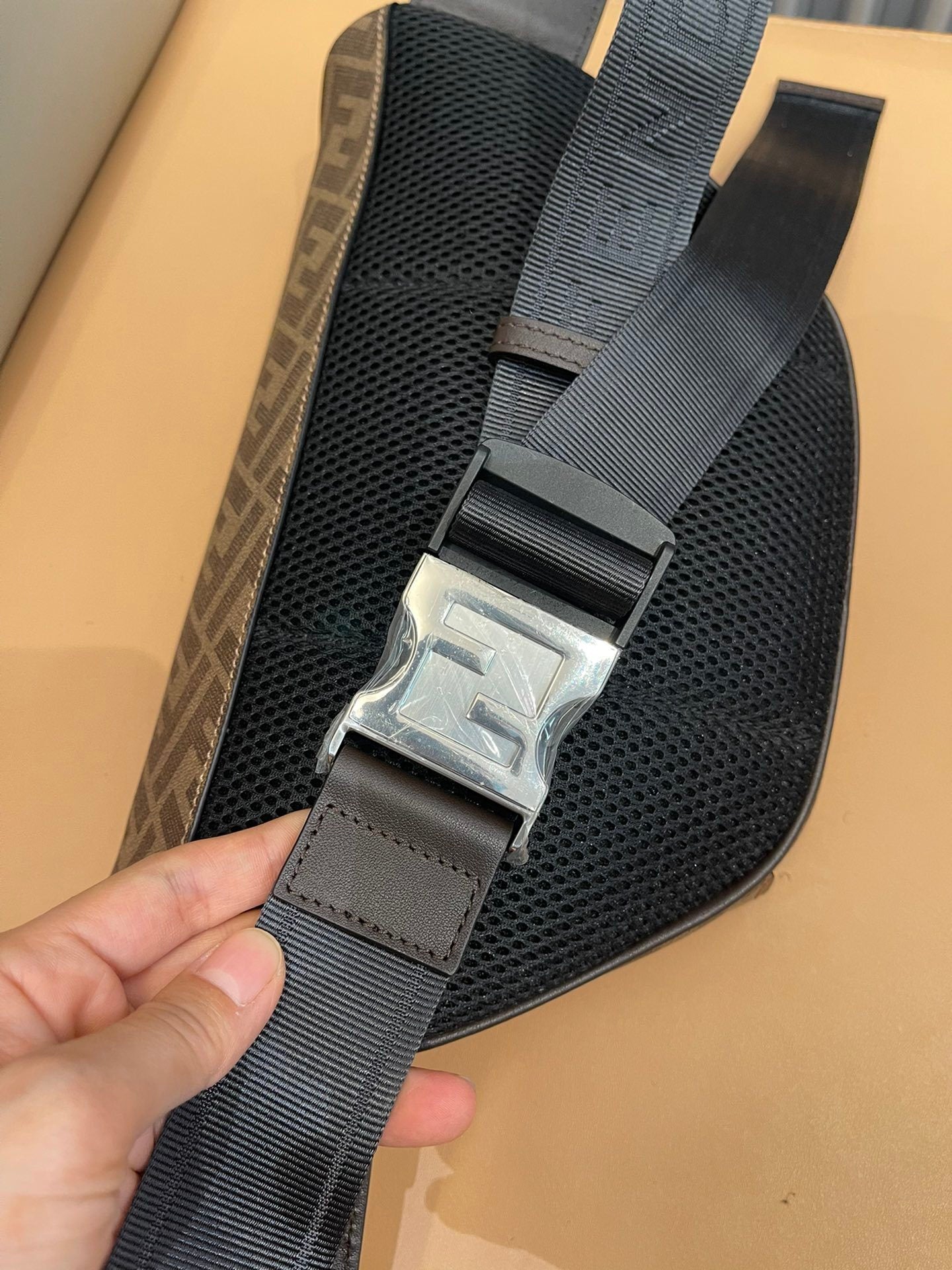 Stylish Fendi Belt Bag With Iconic FF Pattern And Bold Yellow Branding 7vA562
