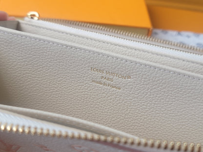 Elegant Louis Vuitton White Leather Wallet With Pink Monogram Embossing For Sophisticated Style M13644