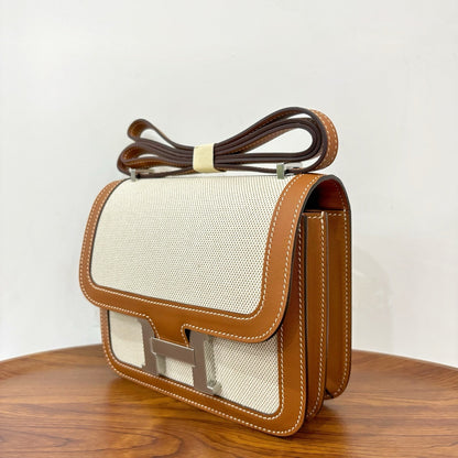 Stylish Hermès Constance - Inspired Canvas and Leather Crossbody Bag with Gold H Buckle 1922