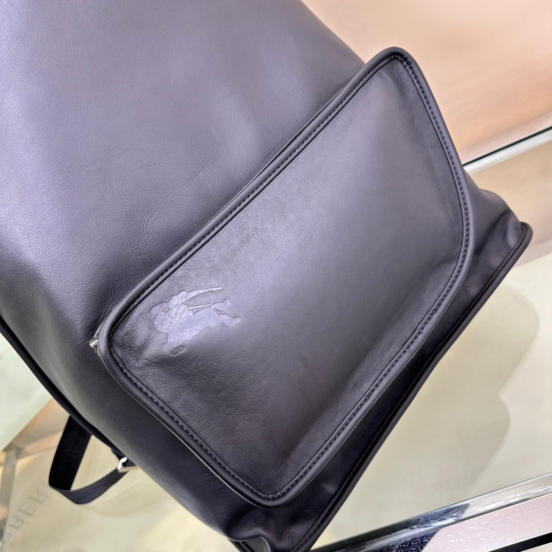 Sleek Black Leather Burberry Backpack With Embossed Logo And Functional Pockets Style No.6021