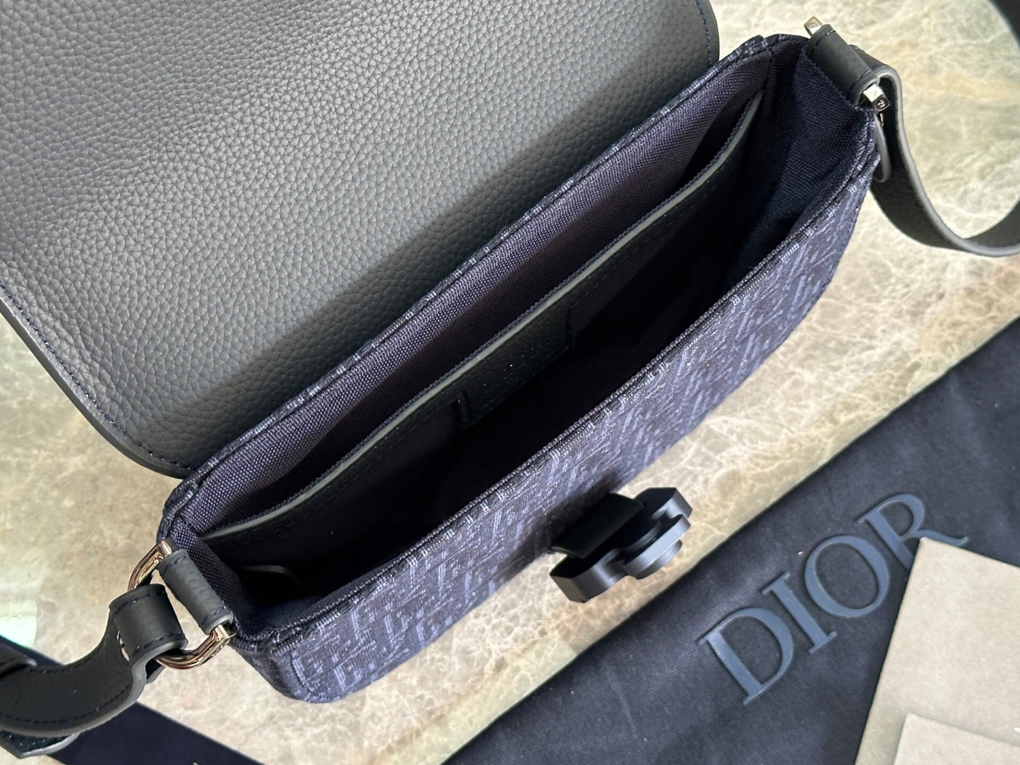 Stylish Dior Saddle Bag With Signature Monogram And Leather Accents CA435
