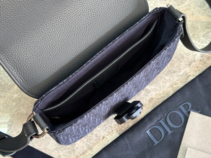 Stylish Dior Saddle Bag With Signature Monogram And Leather Accents CA435