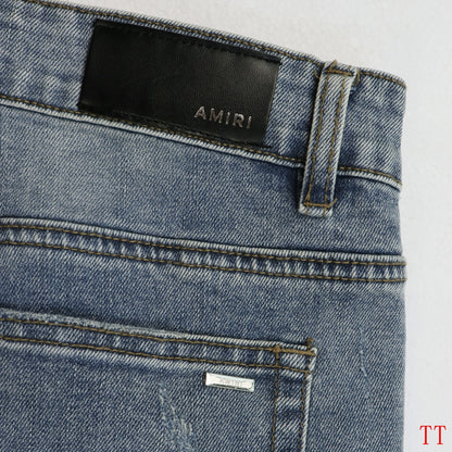 Amiri Light Blue Distressed Jeans With Colorful Embroidered Patterns