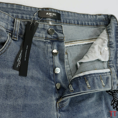 Amiri Light Blue Distressed Jeans With Colorful Embroidered Patterns