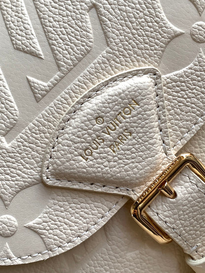 Elegant Louis Vuitton White/Black/Pink Embossed Leather Backpack With Functional Pockets And Gold Accents