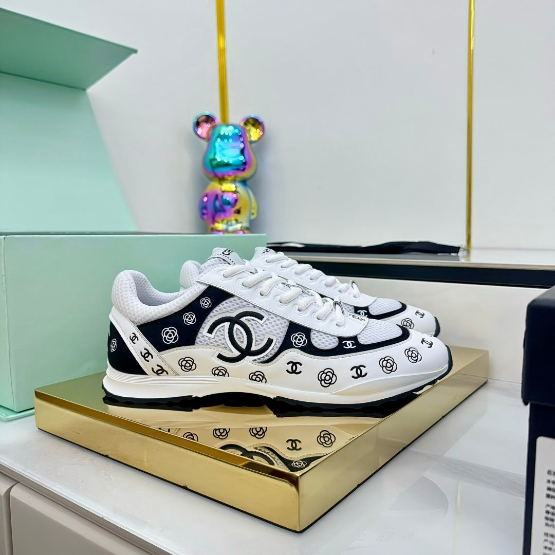 Chanel Silver - Toned Sneakers with Camellia and CC Logo