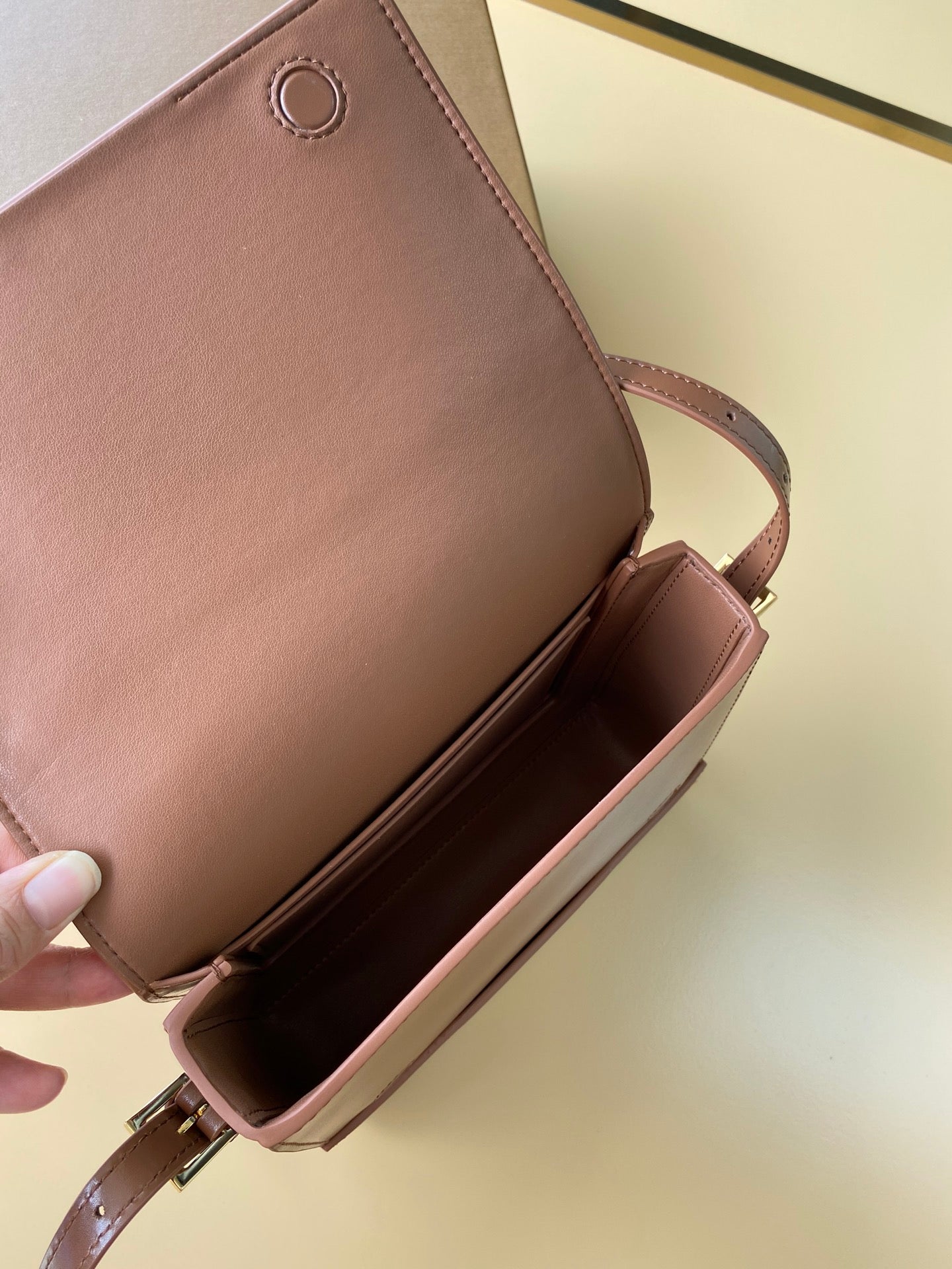 Elegant Black/Brown Burberry Crossbody Bag With Gold Branding And Adjustable Strap Style No.595155