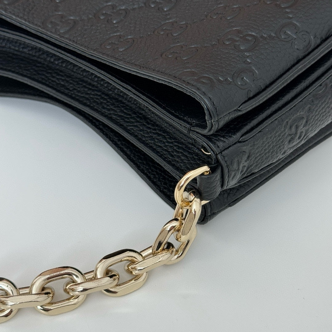 Gucci Black Embossed GG Leather Shoulder Bag with Chunky Gold - Tone Chain Strap 815263