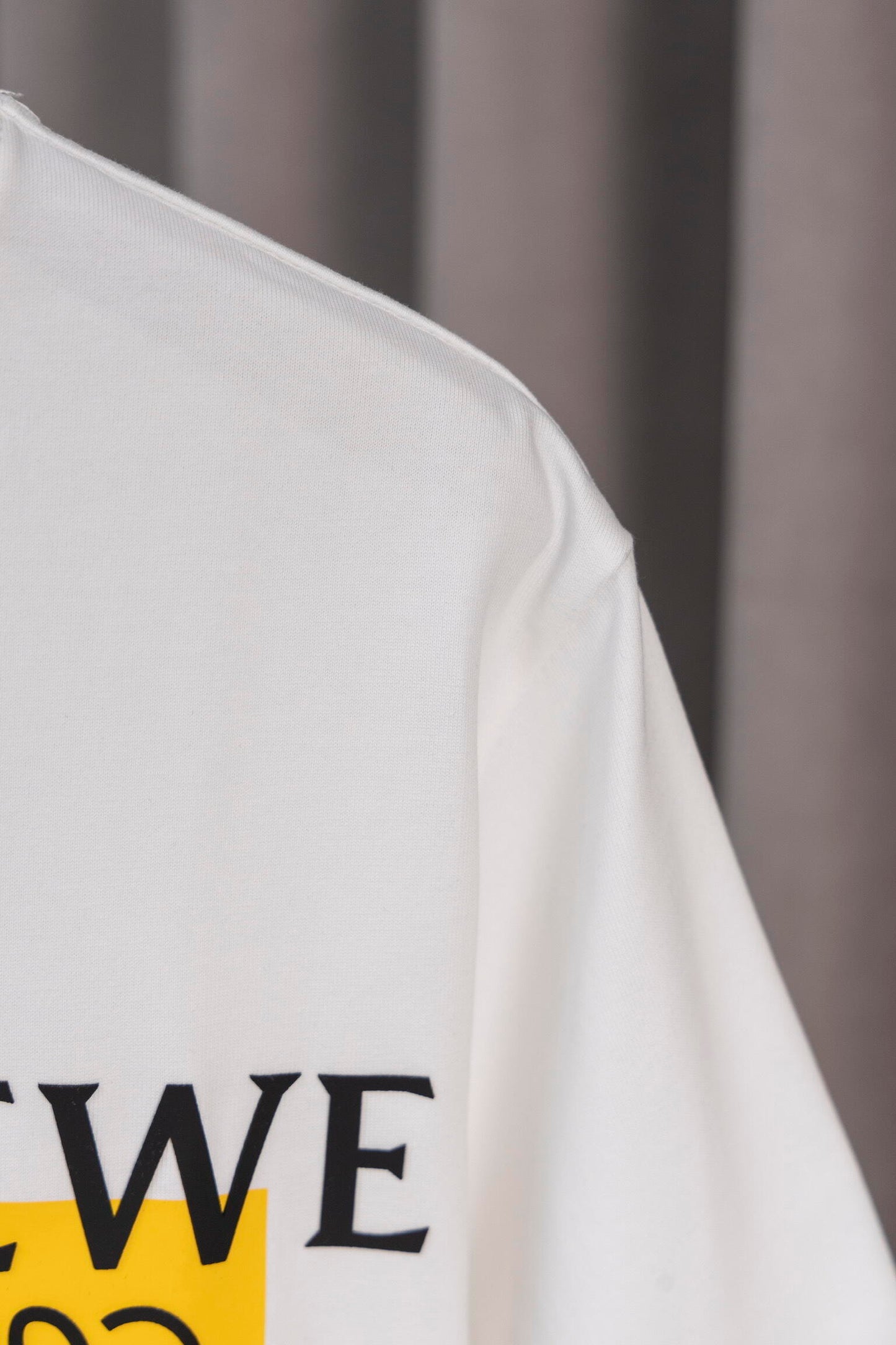 LOEWE White/Black Tee With Yellow Logo Patch For Stylish Casual Wardrobe Update