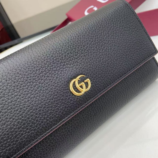 Luxury Black Gucci Long Wallet With Iconic Gold GG Logo And Pebbled Leather Finish 456116