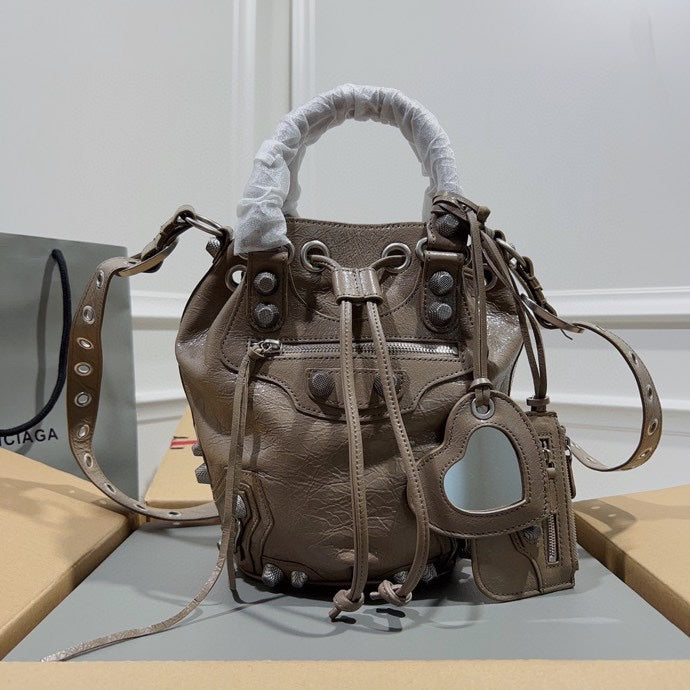 Metallic Balenciaga Bucket Bag with Studs and Adjustable Straps for Edgy Fashion Style No.3033