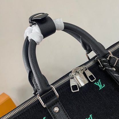 Luxury Black Travel Duffel Bag with Colorful LV Monogram for Stylish Weekend Getaways