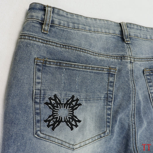 Amiri Light Blue Distressed Jeans With Colorful Embroidered Patterns