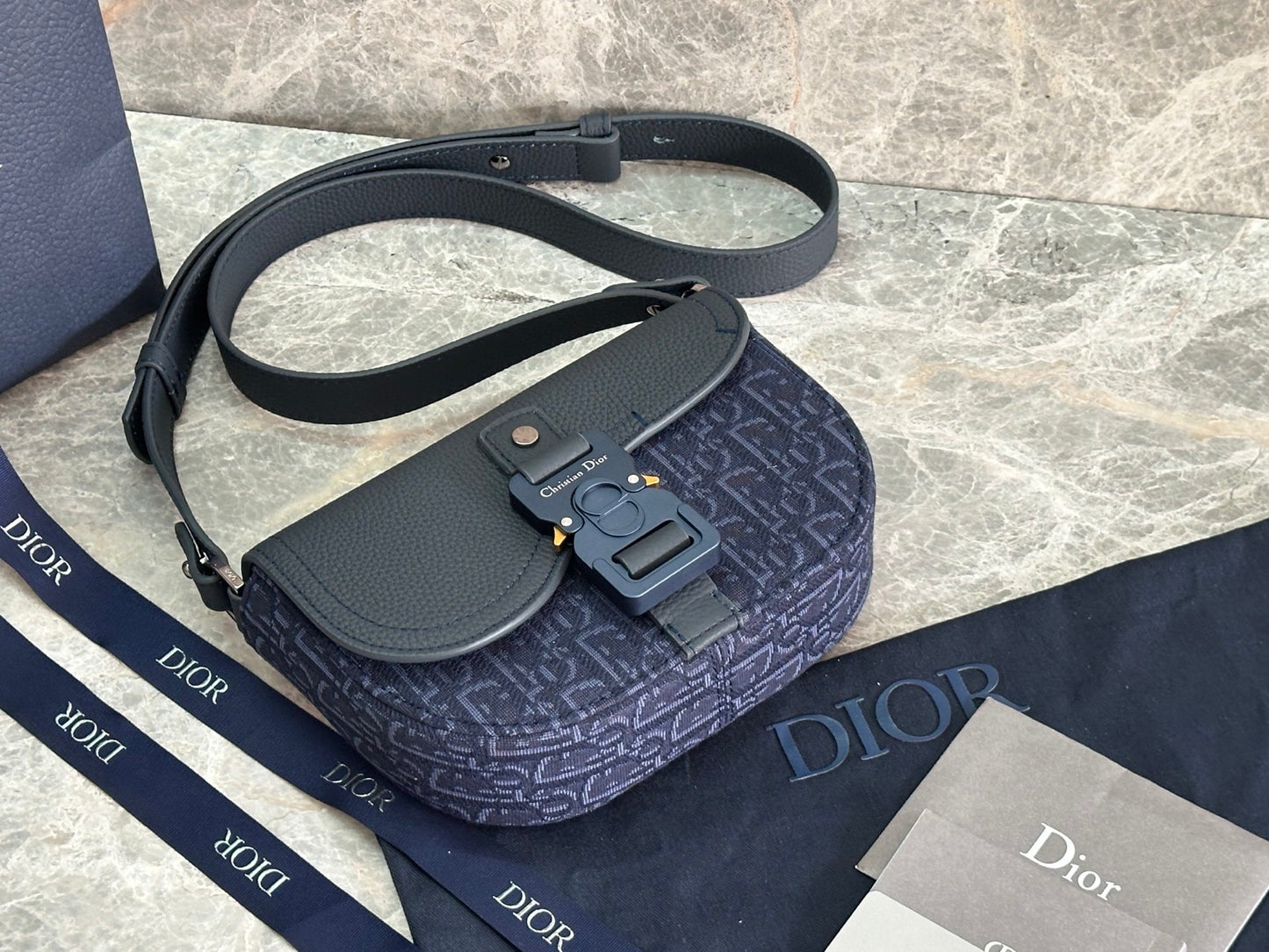 Stylish Dior Saddle Bag With Signature Monogram And Leather Accents CA435