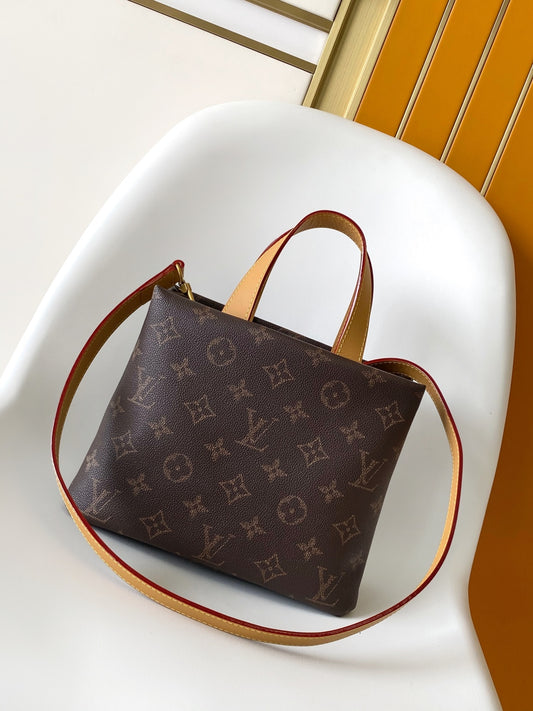 Elegant Louis Vuitton Monogram Canvas Tote Bag With Leather Handles And Gold Branding