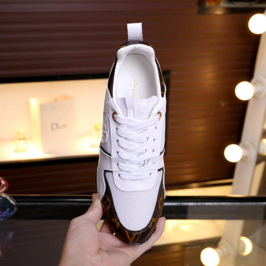 Louis Vuitton Women's White Fashion Sneakers With Signature Patterns And Gold Accents