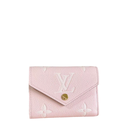 Chic Louis Vuitton Pink Leather Wallet With Embossed Monogram And Gold Accent M14229