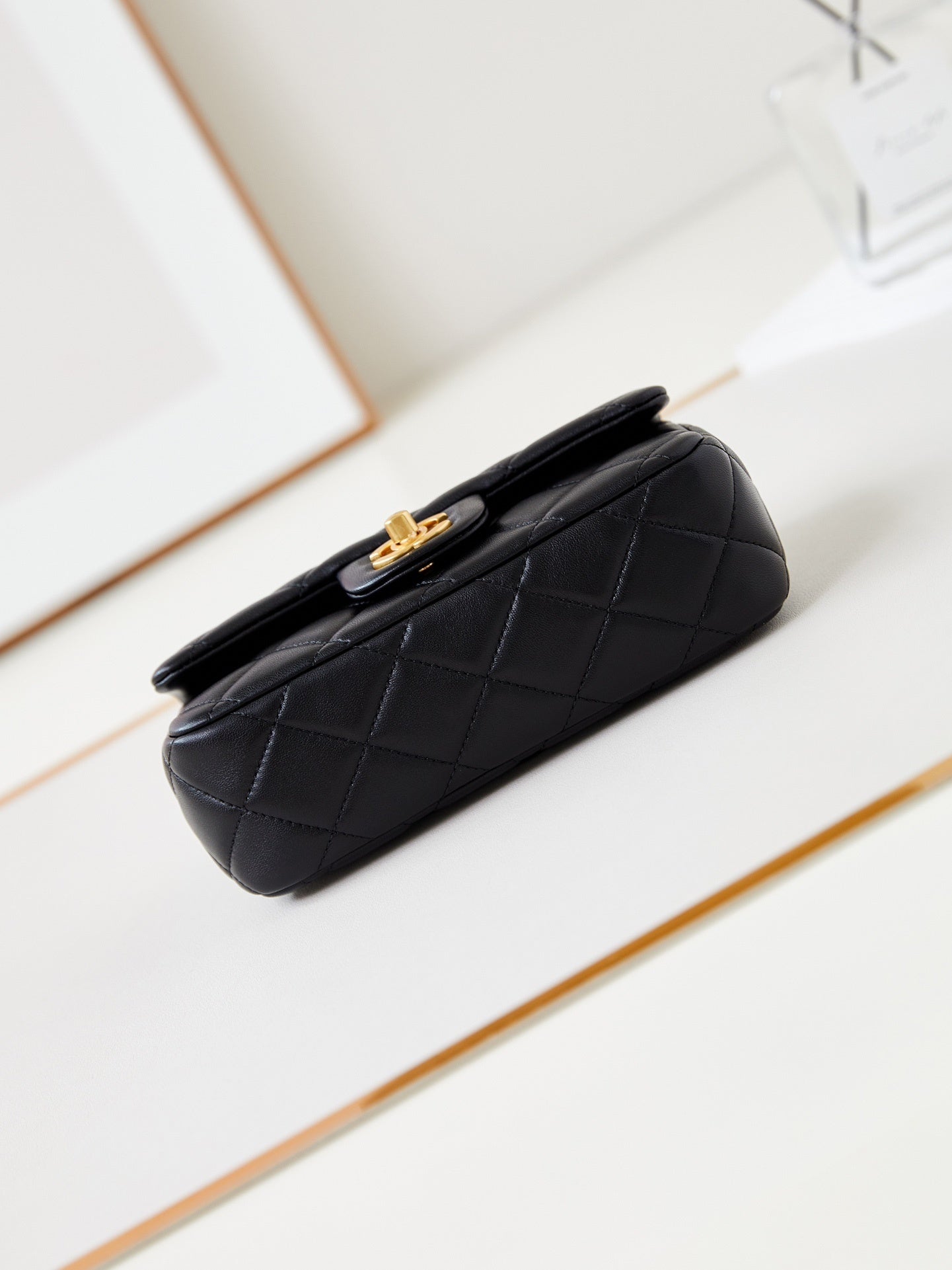 Chanel Black Quilted Leather Handbag With Gold Chain And Signature CC Logo AS4947