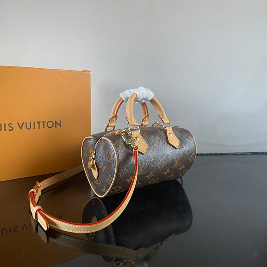 Stylish Louis Vuitton Nano Speedy Bag with Iconic Monogram and Luxe Leather Details