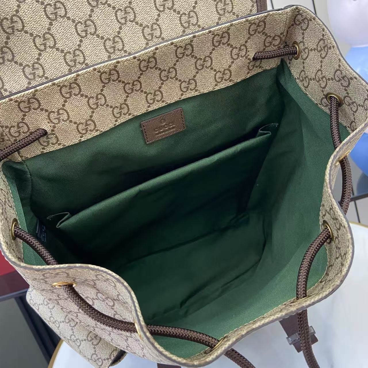 Classic Gucci Backpack With Iconic GG Pattern Web Stripe And Gold Accents For Timeless Style 839110