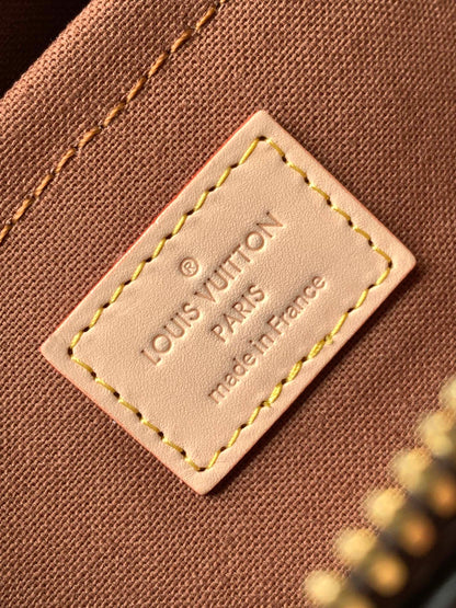 Louis Vuitton Speedy Bandoulière Bag With Colorful Charms And Stylish Strap For Fashion Enthusiasts