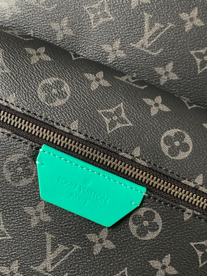 Stylish Louis Vuitton Monogram Backpack With Turquoise Accents And Functional Design