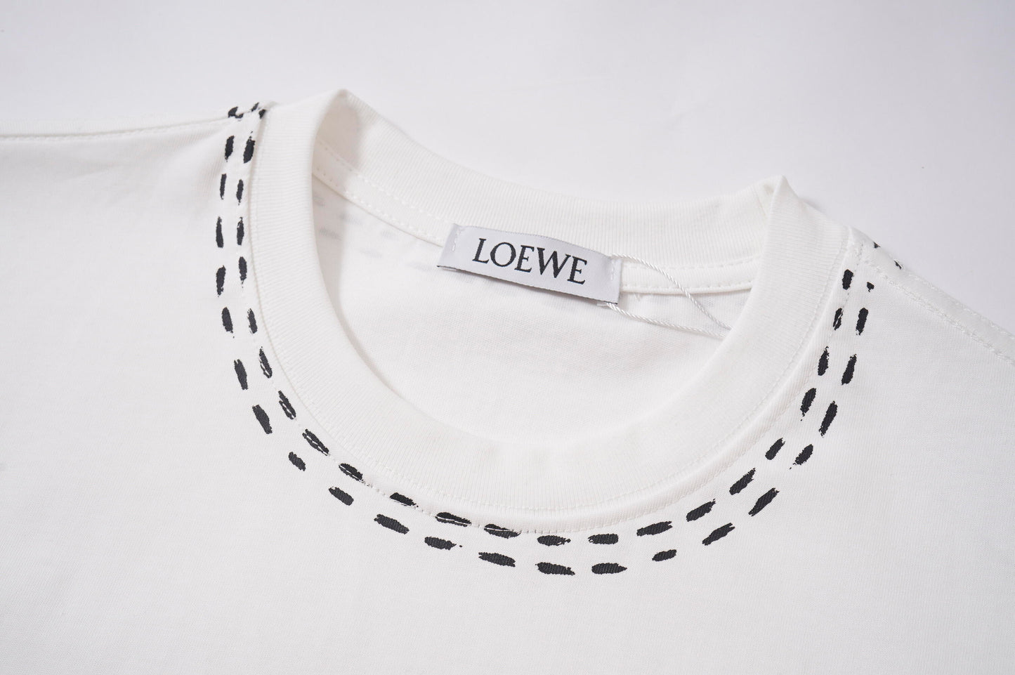 LOEWE Black/White Tee With Colorful Emblem And Stitch Detailing For Chic Streetwear