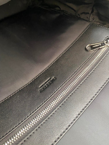 Sleek Black Burberry Backpack With Durable Nylon Material And Signature Branding Style No.3316