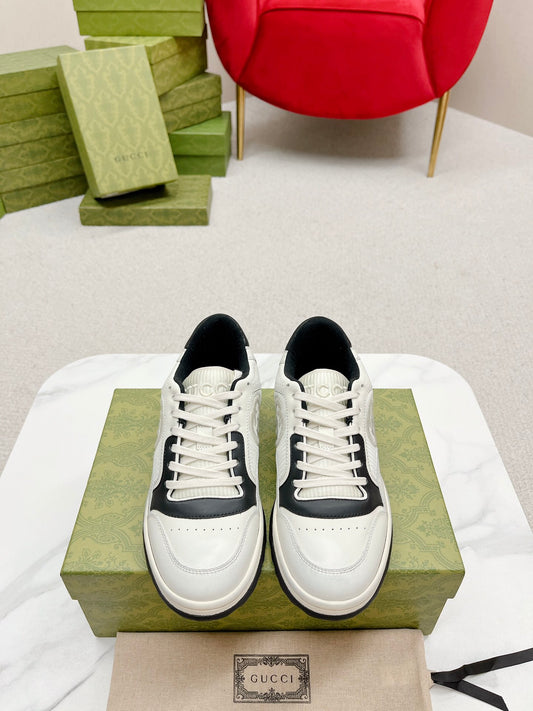 Stylish White And Pink Gucci Sneakers On Display