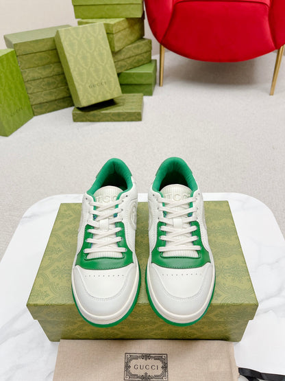 Stylish White And Pink Gucci Sneakers On Display