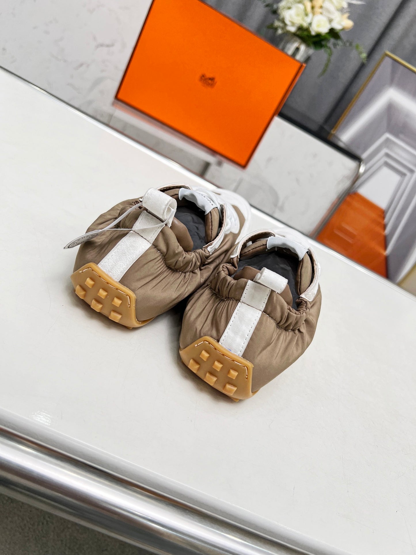 Hermès Unisex Brown And White Sneakers For Luxury Casual Style