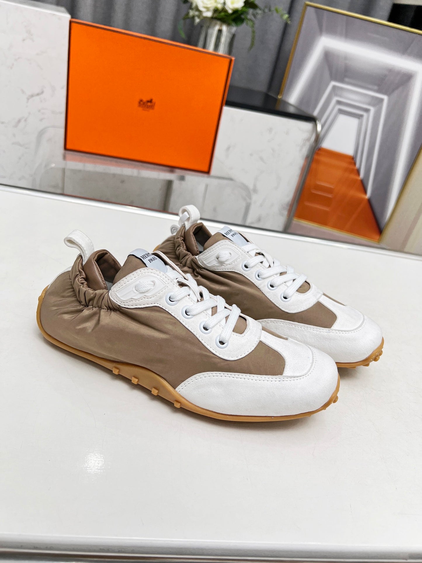 Hermès Unisex Brown And White Sneakers For Luxury Casual Style