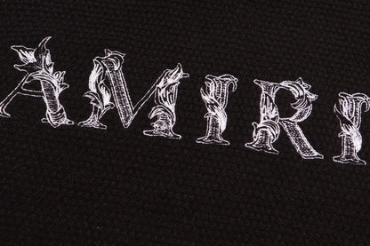 Amiri Men's Black Crew Neck Knitted Sweater With Intricate Lettering Design