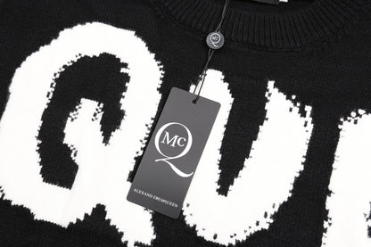 Alexander McQueen Black Sweater With White QUE Graphic Design