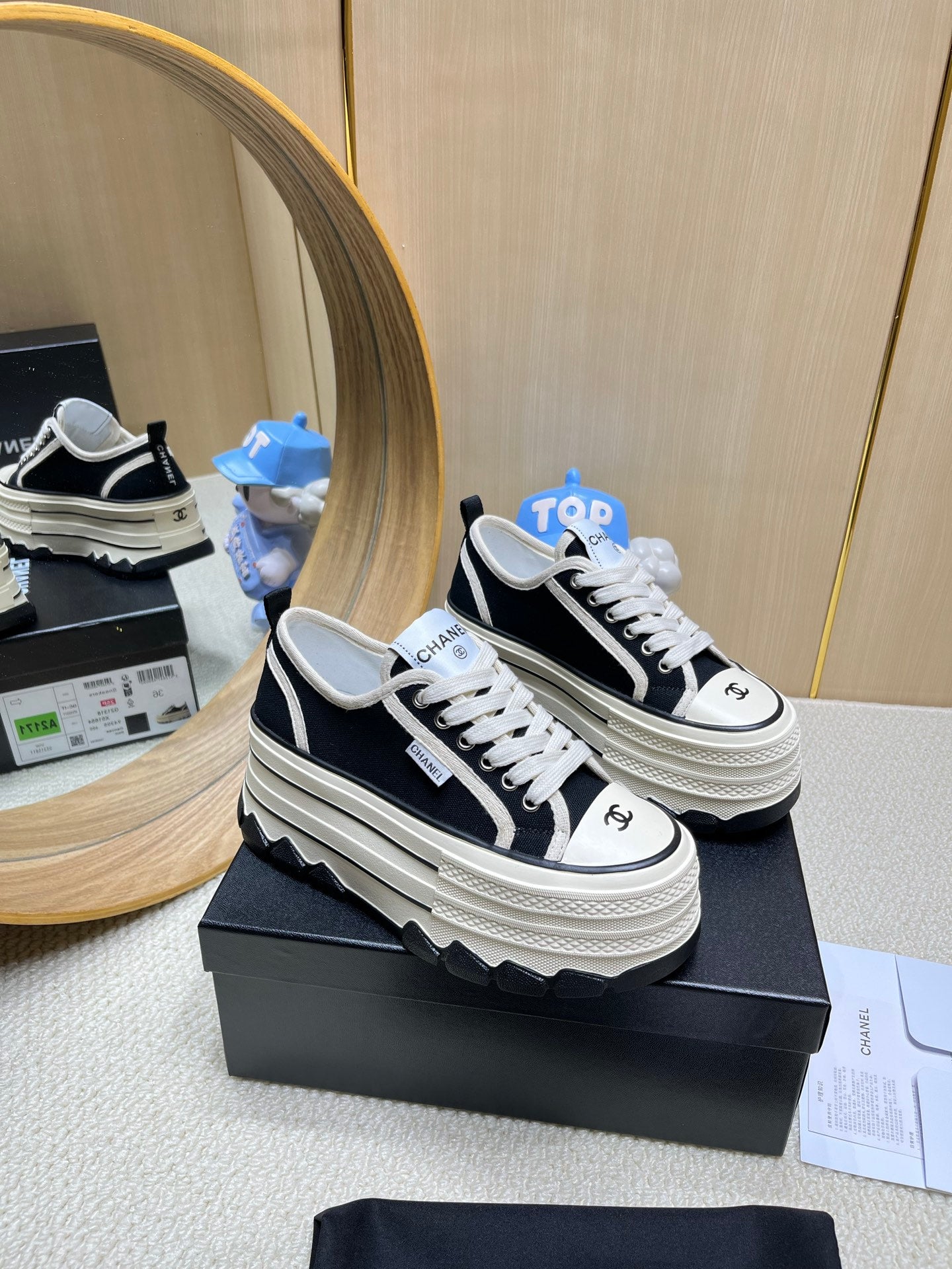 Chanel Black And White Platform Canvas Sneakers With CC Logo