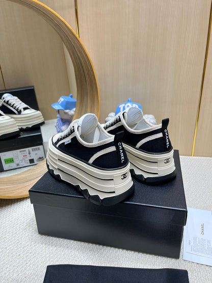 Chanel Black And White Platform Canvas Sneakers With CC Logo