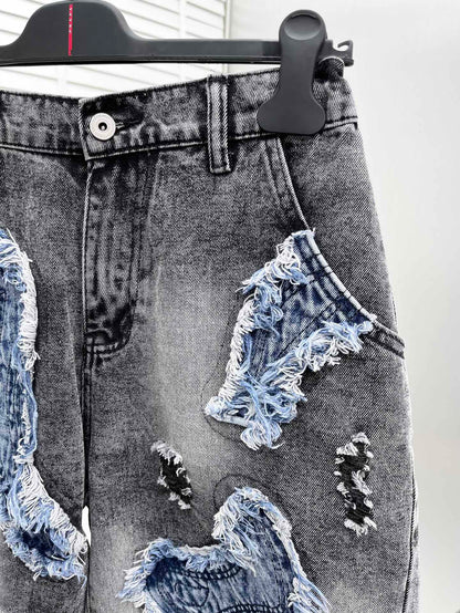 Balenciaga Distressed Patchwork Denim Shorts With Vintage Style