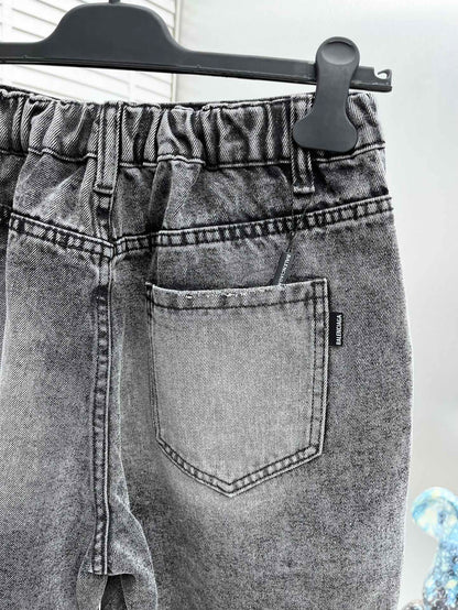 Balenciaga Distressed Patchwork Denim Shorts With Vintage Style
