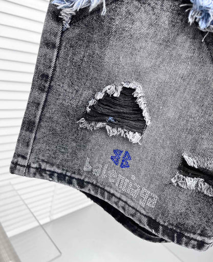 Balenciaga Distressed Patchwork Denim Shorts With Vintage Style