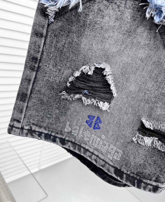 Balenciaga Distressed Patchwork Denim Shorts With Vintage Style