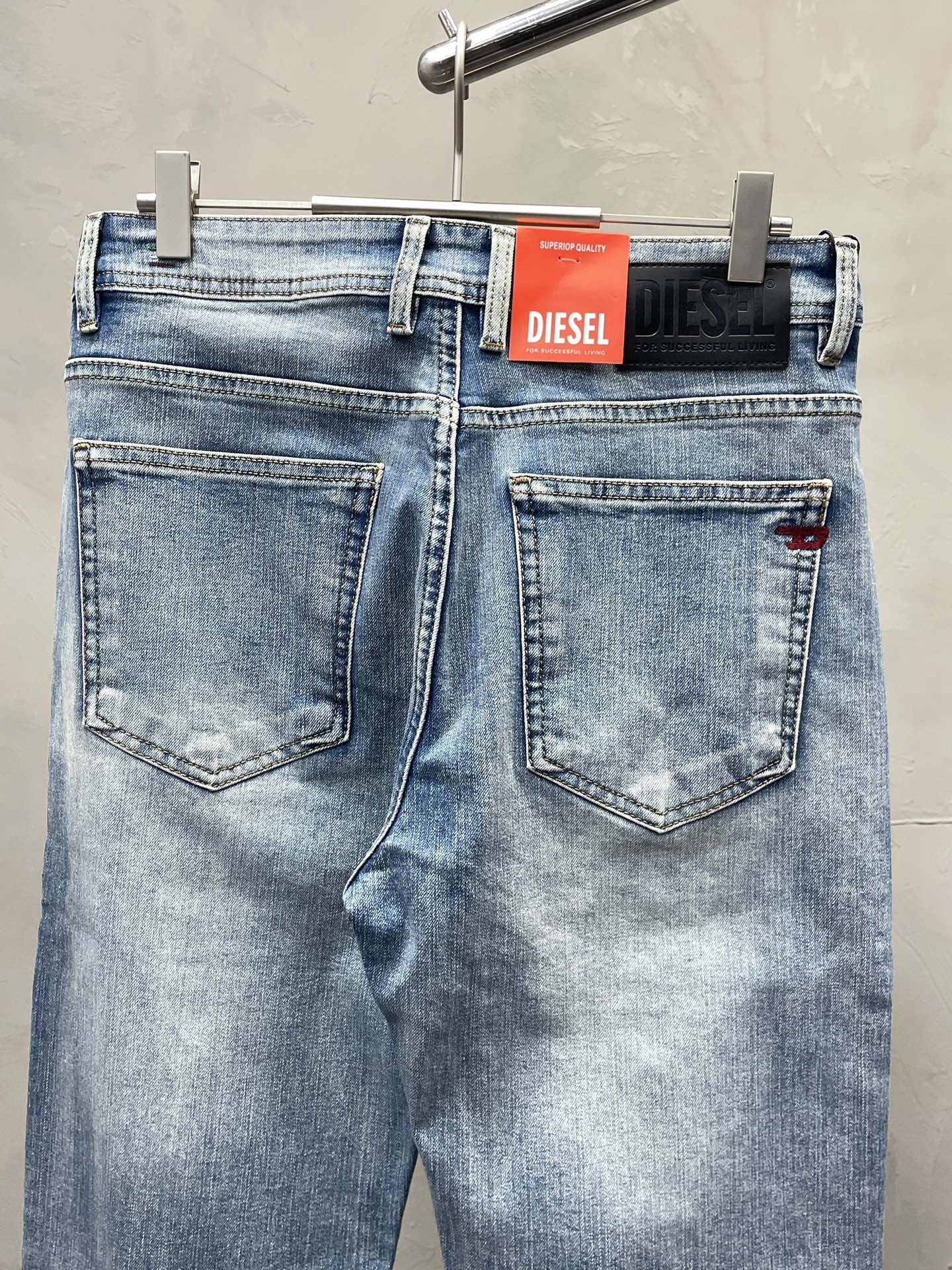 Diesel Men's Light Blue Washed Slim-Fit Denim Jeans with Iconic Details